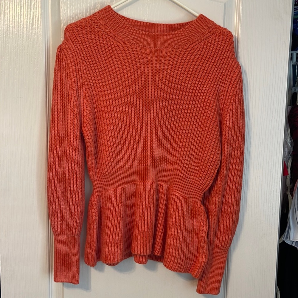 Orange peplum sweater